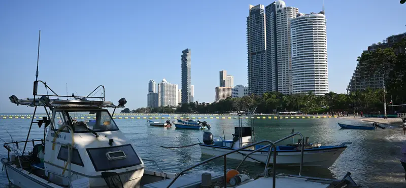 view of harbor with high rise buildings