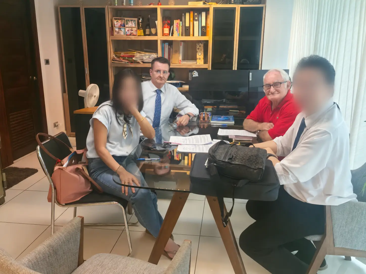 Jouni Ollila assisting clients during a property transaction