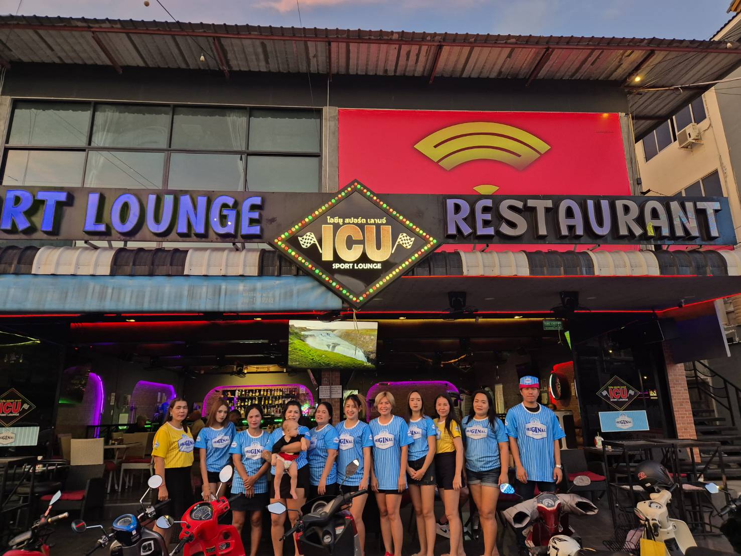 The ICU team outside ICU Sport Lounge and Restaurant in Pattaya